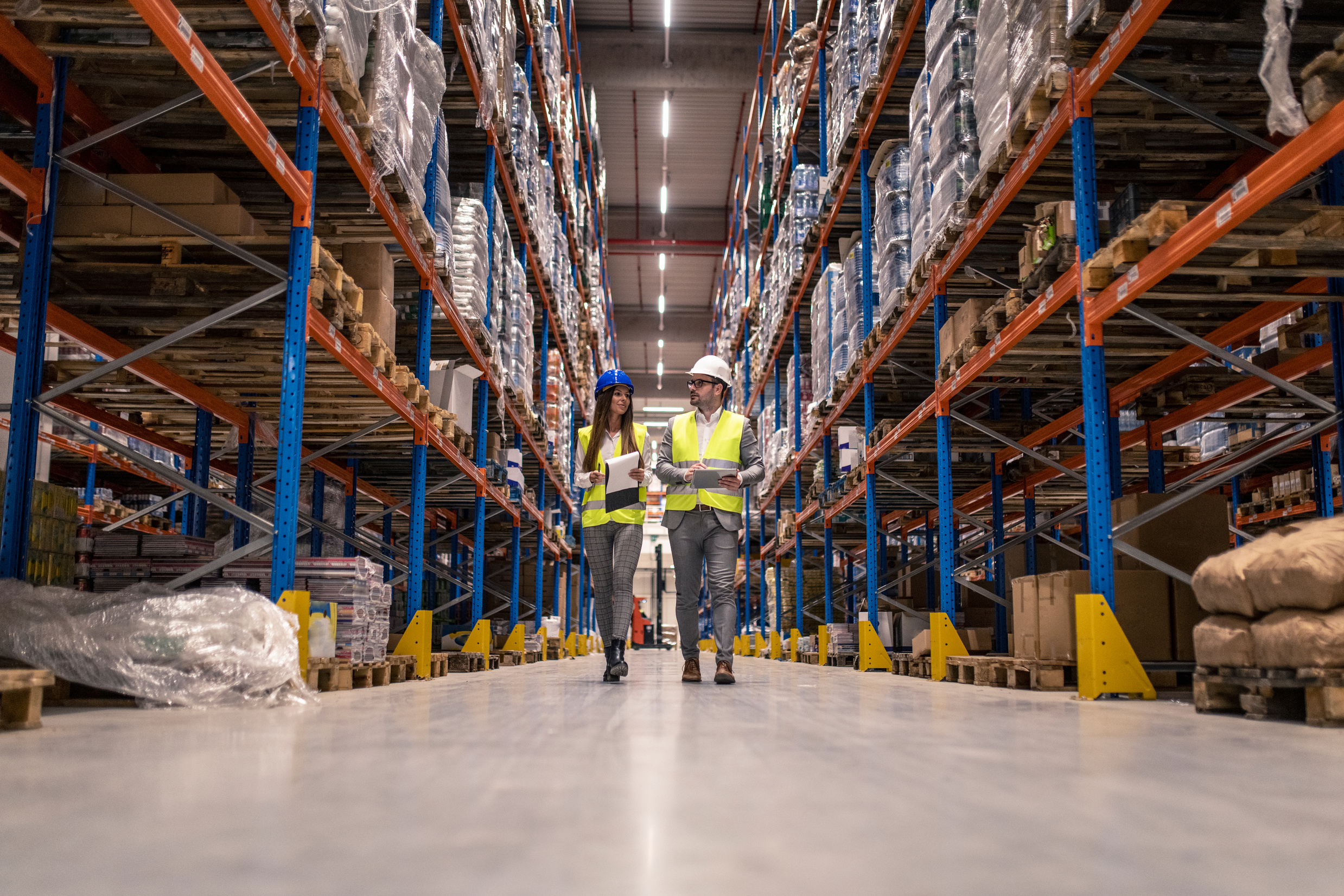 Managers visit warehouse distribution center.