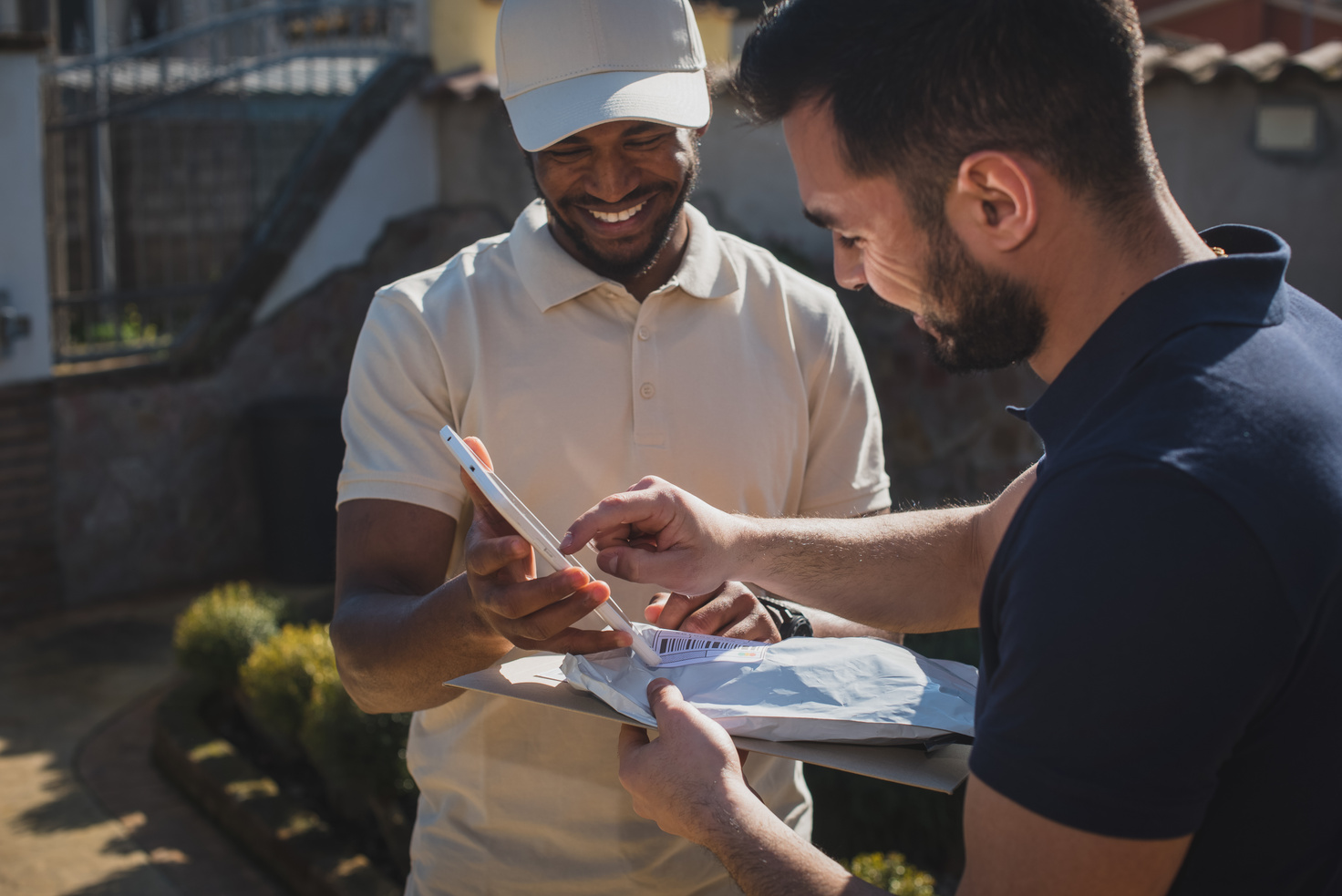 Courier Service Man Receiving a Delivery